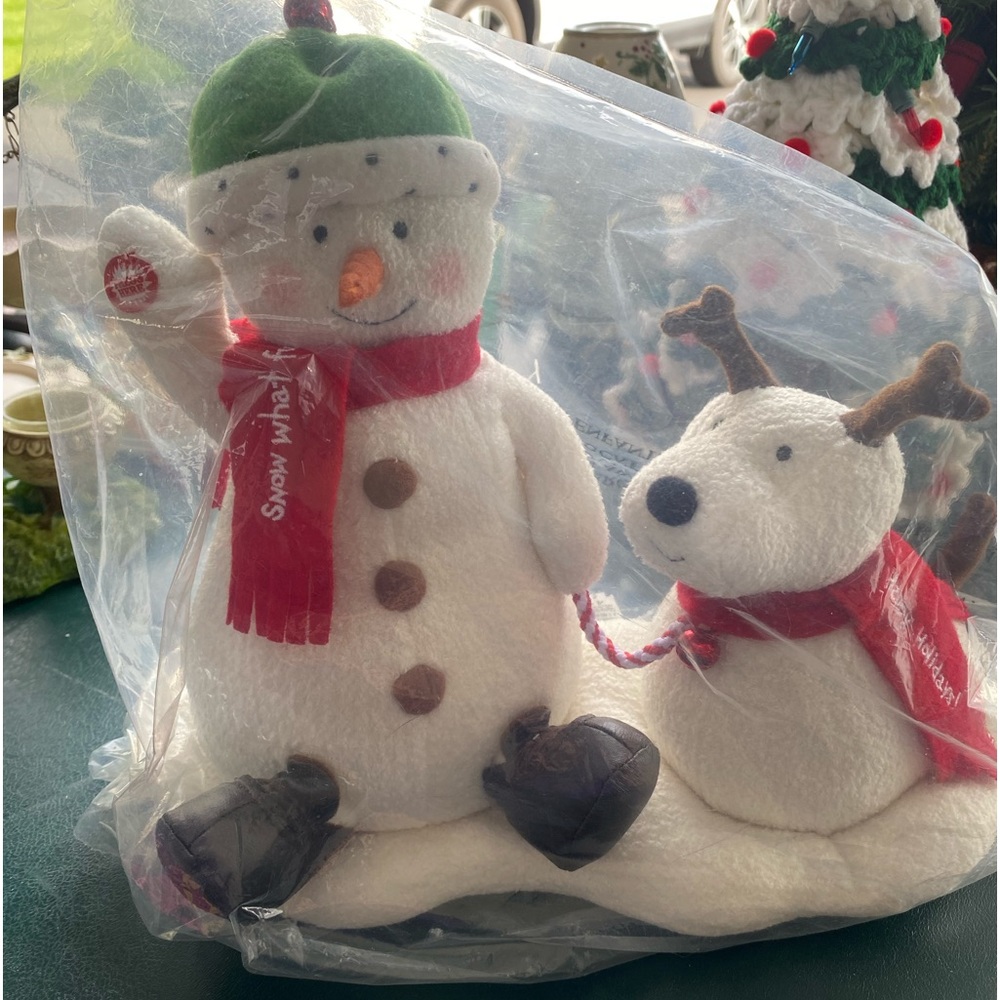 Hallmark singing Snowman and lighted tree.